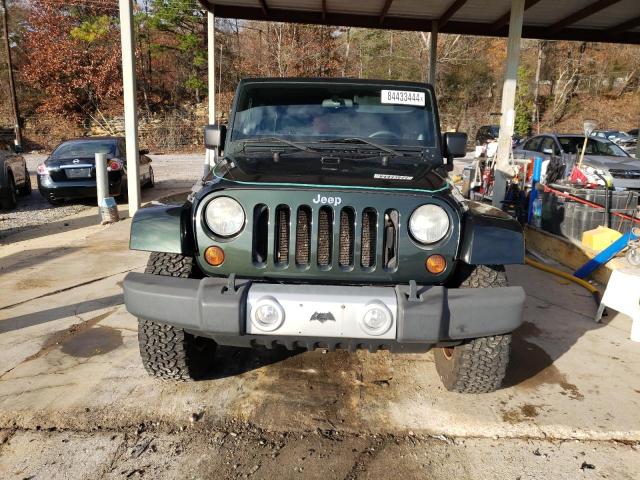 Photo 5 from auction – 2011 JEEP WRANGLER U with VIN 1J4BA5H15BL635016