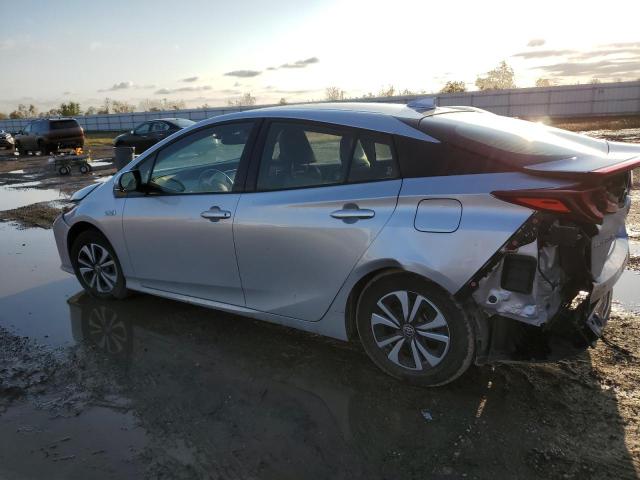 Photo 2 from auction – 2018 TOYOTA PRIUS PRIM with VIN JTDKARFP7J3069833