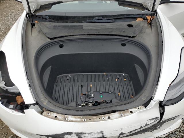 Photo 11 from auction – 2021 TESLA MODEL 3 with VIN 5YJ3E1EB4MF004266
