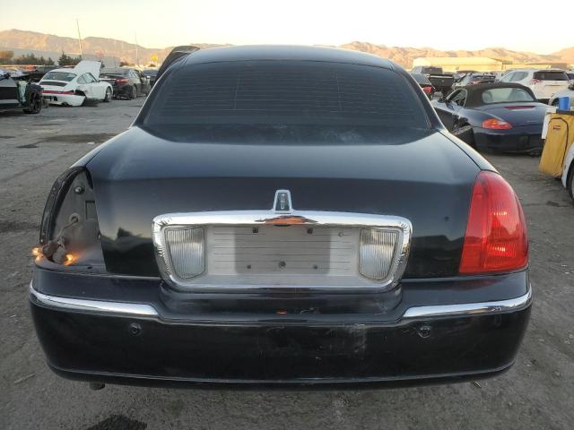 Photo 6 from auction – 2004 LINCOLN TOWN CAR U with VIN 1LNHM83W64Y615466