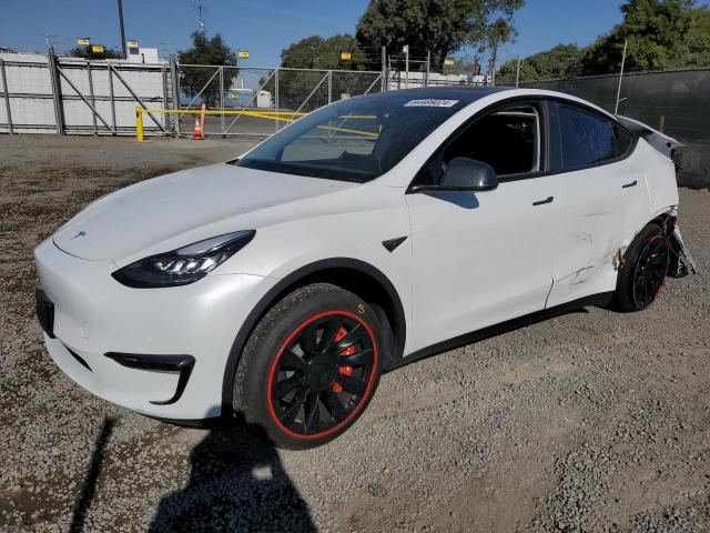 TESLA MODEL Y 2022 with VIN 7SAYGDEE7NF576402 - Photo from auction