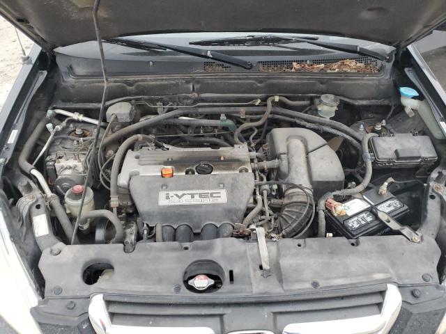 Photo 11 from auction – 2004 HONDA CR-V EX with VIN JHLRD78814C017394