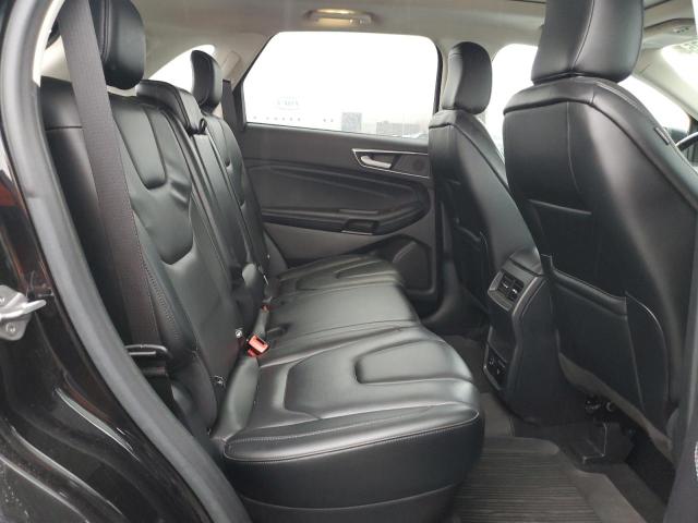 Photo 11 from auction – 2021 FORD EDGE TITAN with VIN 2FMPK4K90MBA09602