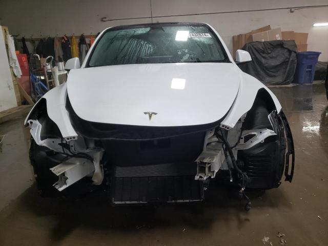 Photo 5 from auction – 2023 TESLA MODEL Y with VIN 7SAYGDEE2PF601838