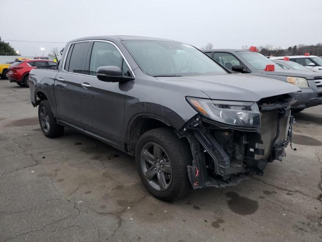 Photo 4 from auction – 2022 HONDA RIDGELINE with VIN 5FPYK3F73NB017541
