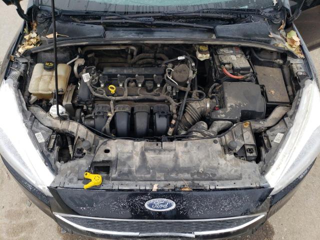 Foto 11 de la subasta – 2018 FORD FOCUS S con VIN 1FADP3E27JL287349