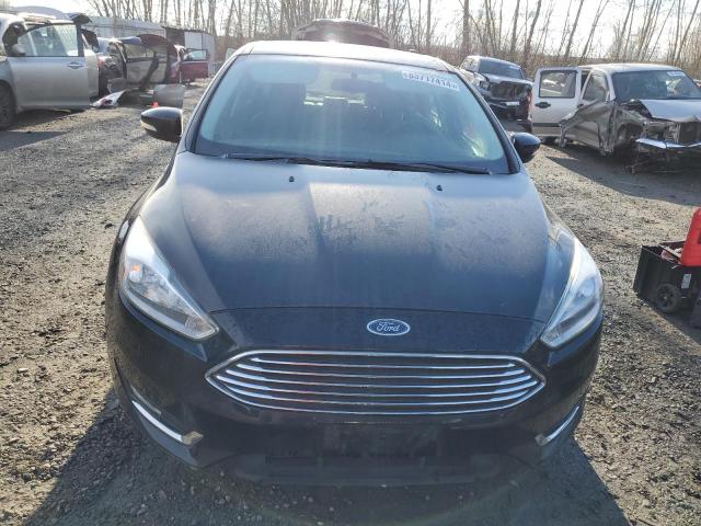 Photo 5 from auction – 2016 FORD FOCUS TITA with VIN 1FADP3N27GL319516