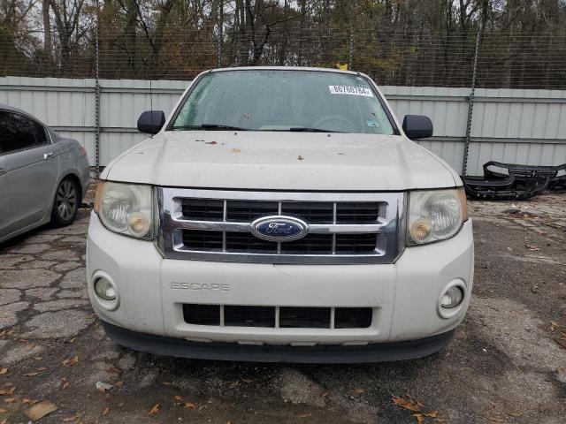 Photo 5 from auction – 2011 FORD ESCAPE with VIN 1FMCU0D72BKB09524