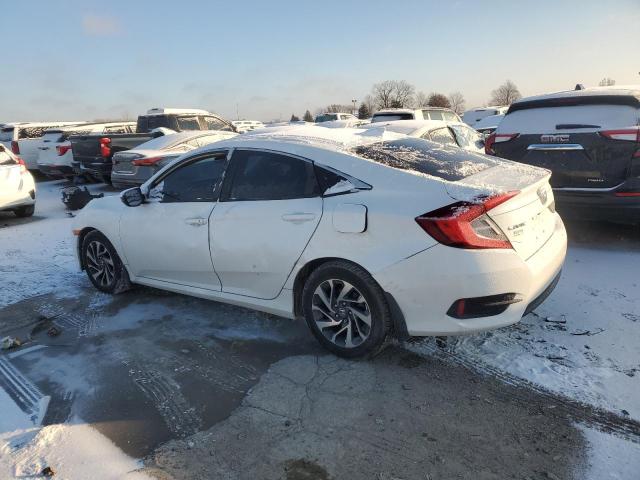 Photo 2 from auction – 2018 HONDA CIVIC EX with VIN 19XFC2F72JE043958