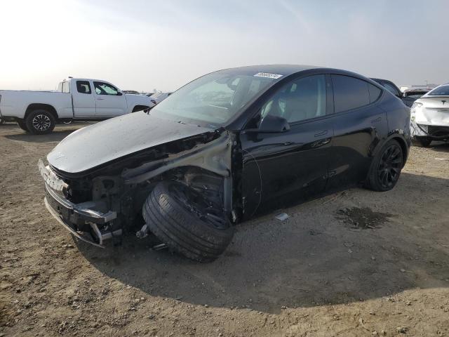 TESLA MODEL Y 2023 with VIN 7SAYGDEE9PF937776 - Photo from auction