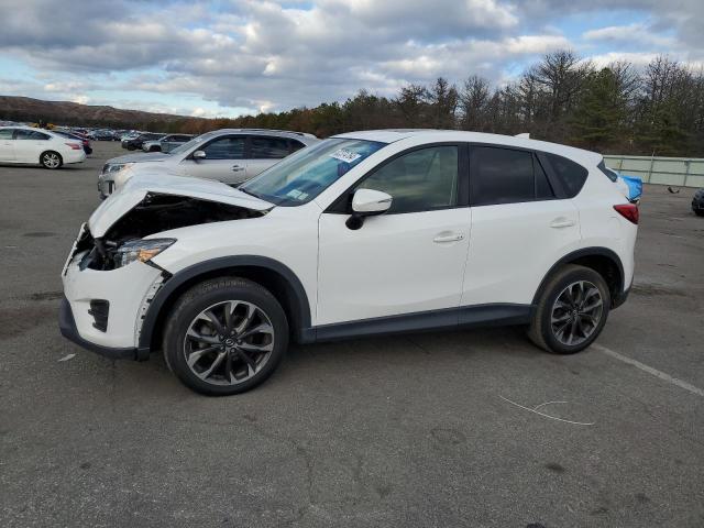MAZDA CX-5 GT 2016 with VIN JM3KE4DY0G0639370 - Photo from auction