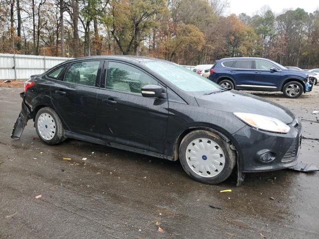 Photo 4 from auction – 2014 FORD FOCUS SE with VIN 1FADP3F26EL351675