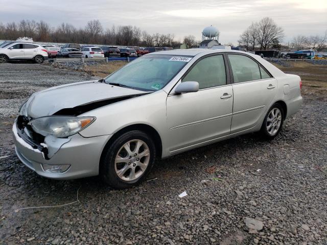 TOYOTA CAMRY LE 2005 with VIN 4T1BF30K55U084693 - Photo from auction