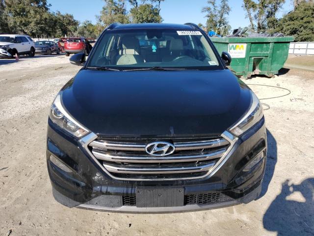 Photo 5 from auction – 2016 HYUNDAI TUCSON LIM with VIN KM8J3CA22GU098265