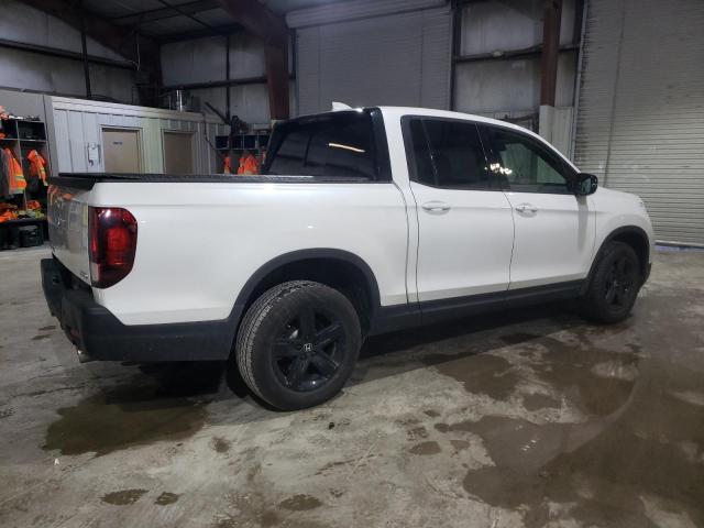 Photo 3 from auction – 2022 HONDA RIDGELINE with VIN 5FPYK3F83NB038446