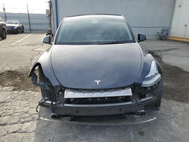 Photo 5 from auction – 2023 TESLA MODEL Y with VIN 7SAYGDEE9PA038638