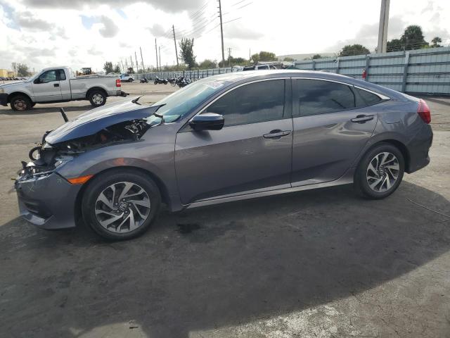 HONDA CIVIC EX 2017 with VIN 19XFC2F70HE069260 - Photo from auction