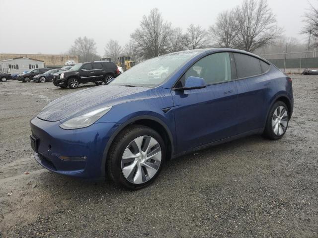 TESLA MODEL Y 2023 with VIN 7SAYGAEE3PF946195 - Photo from auction