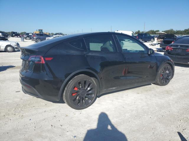 Photo 3 from auction – 2023 TESLA MODEL Y with VIN 7SAYGDEF8PF921402
