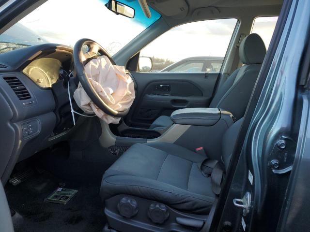 Photo 7 from auction – 2006 HONDA PILOT LX with VIN 2HKYF18116H553837