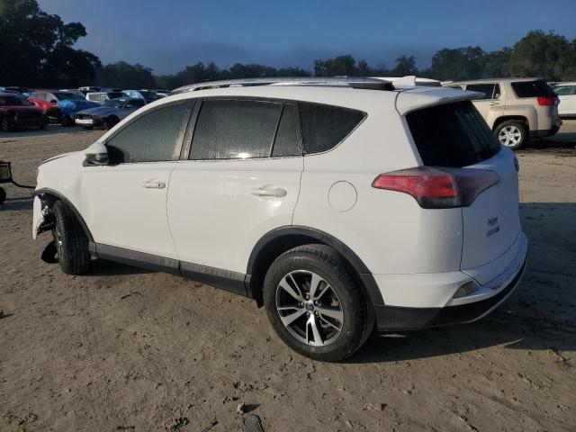 Photo 2 from auction – 2016 TOYOTA RAV4 XLE with VIN JTMWFREV8GJ075082