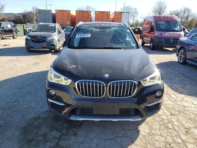 Photo 5 from auction – 2017 BMW X1 XDRIVE2 with VIN WBXHT3C35H5F80769