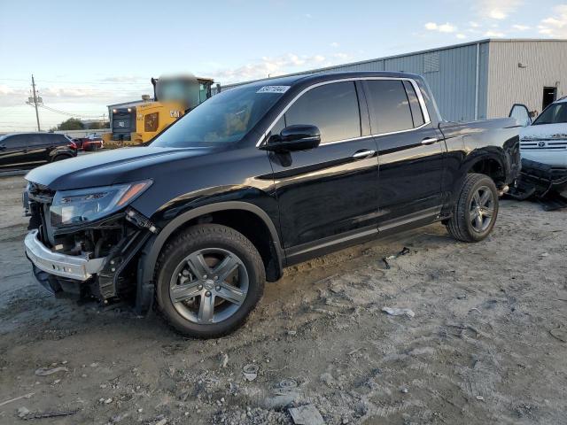 Photo 1 from auction – 2023 HONDA RIDGELINE with VIN 5FPYK3F70PB038897