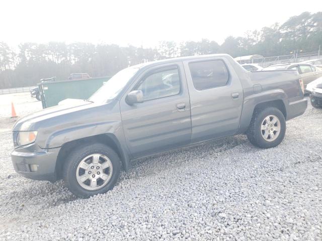 HONDA RIDGELINE 2011 with VIN 5FPYK1F46BB001193 - Photo from auction