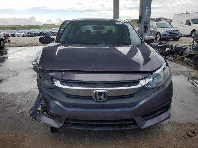 Photo 5 from auction – 2017 HONDA CIVIC LX with VIN 19XFC2F55HE063436
