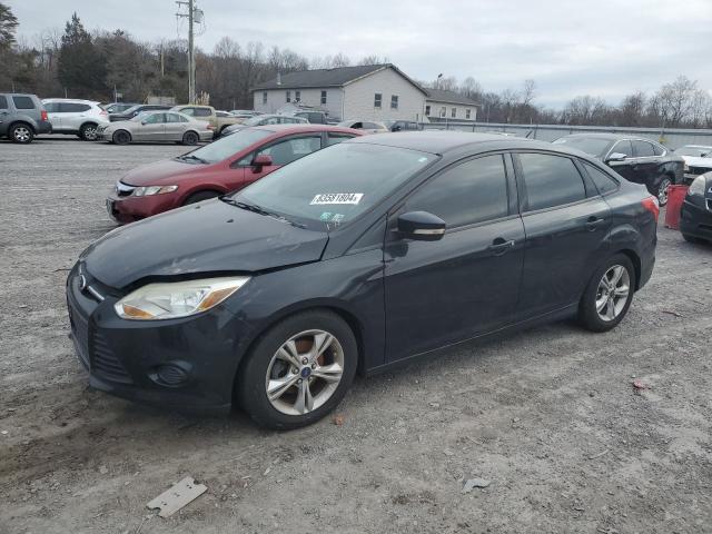 FORD FOCUS SE 2014 with VIN 1FADP3F25EL104700 - Photo from auction
