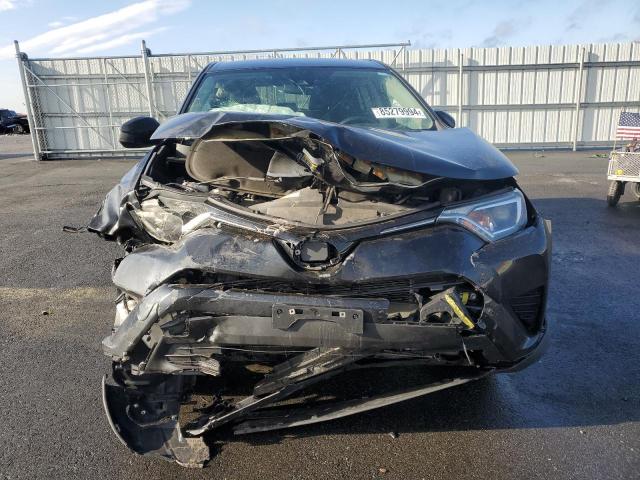 Photo 5 from auction – 2018 TOYOTA RAV4 LE with VIN 2T3BFREV8JW844087