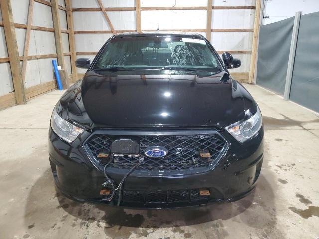 Photo 5 from auction – 2014 FORD TAURUS POL with VIN 1FAHP2MKXEG138252