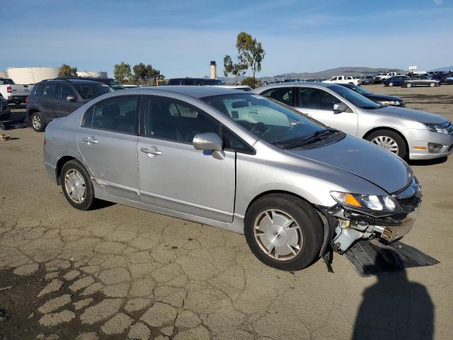 Photo 4 from auction – 2011 HONDA CIVIC HYBR with VIN JHMFA3F2XBS000482