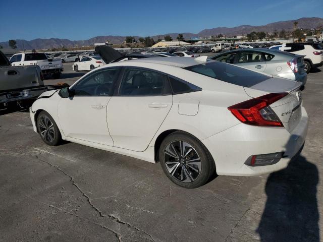Photo 2 from auction – 2016 HONDA CIVIC EX with VIN 2HGFC1F33GH656113