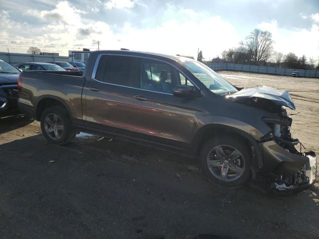Photo 4 from auction – 2022 HONDA RIDGELINE with VIN 5FPYK3F51NB037463