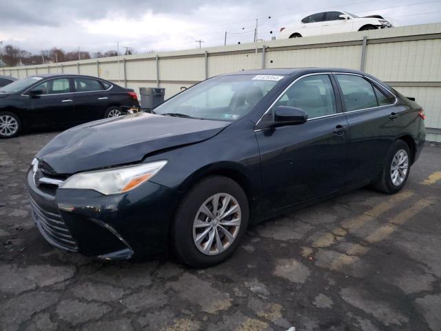 TOYOTA CAMRY LE 2016 with VIN 4T4BF1FK0GR574883 - Photo from auction