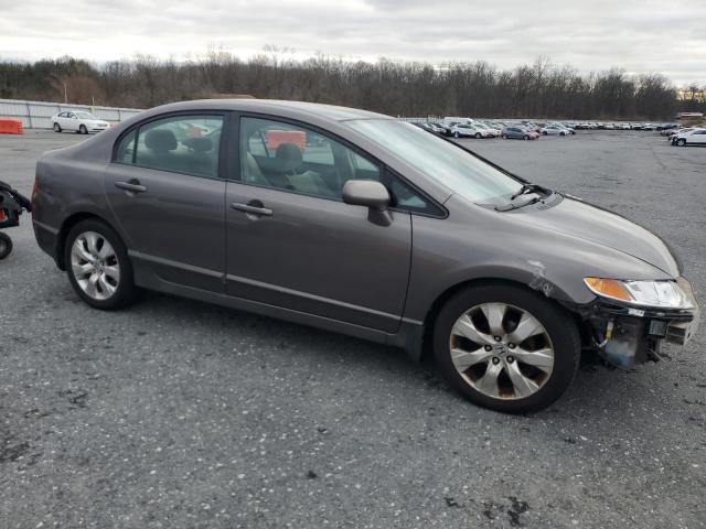 Photo 4 from auction – 2011 HONDA CIVIC LX with VIN 19XFA1F55BE048586