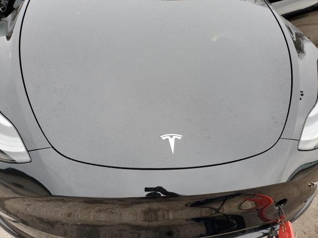Photo 11 from auction – 2023 TESLA MODEL Y with VIN 7SAYGAEE7PF786600