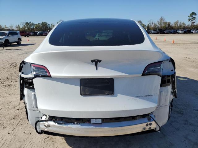 Photo 6 from auction – 2023 TESLA MODEL Y with VIN 7SAYGDEE4PA071028
