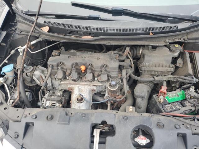 Photo 11 from auction – 2014 HONDA CIVIC LX with VIN 2HGFB2F58EH504352
