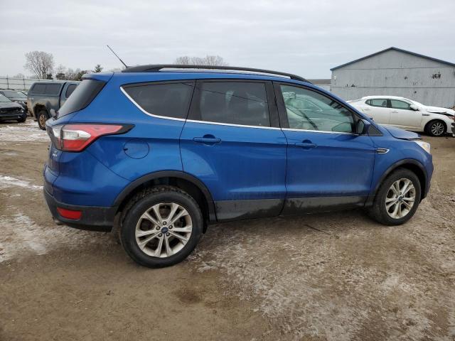 Photo 3 from auction – 2017 FORD ESCAPE SE with VIN 1FMCU9GD7HUF03524