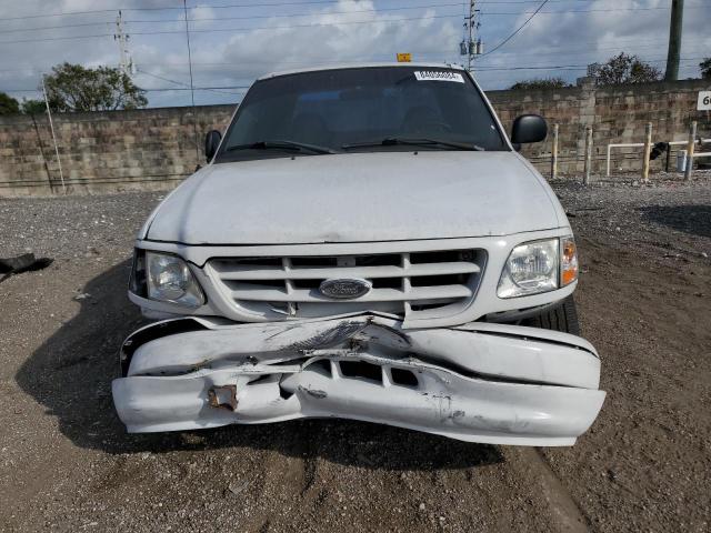 Photo 5 from auction – 2003 FORD F150 with VIN 1FTRX17213NA74132