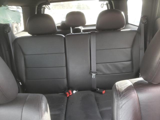 Photo 10 from auction – 2011 FORD ESCAPE LIM with VIN 1FMCU0EGXBKB22844