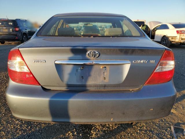 Photo 6 from auction – 2002 TOYOTA CAMRY LE with VIN JTDBE32K020123584