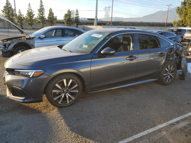 HONDA CIVIC EX 2023 with VIN 2HGFE1F7XPH316387 - Photo from auction