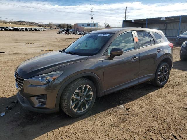 MAZDA CX-5 GT 2016 with VIN JM3KE4DY4G0749869 - Photo from auction