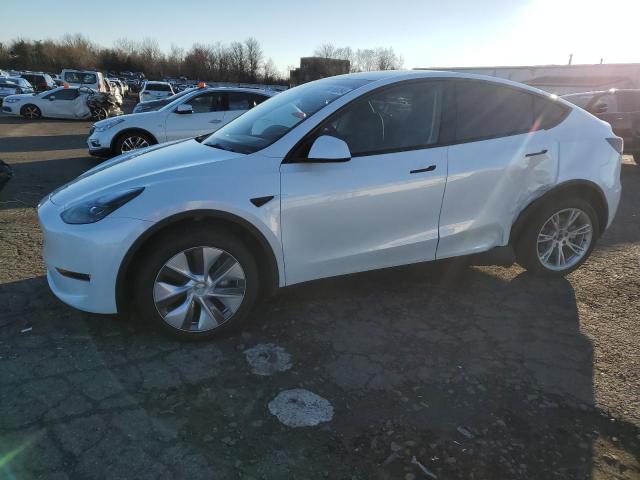 TESLA MODEL Y 2023 with VIN 7SAYGDEE3PA160945 - Photo from auction