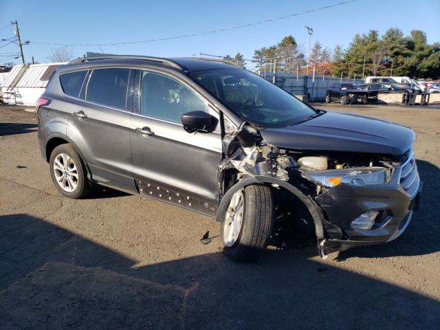 Photo 4 from auction – 2017 FORD ESCAPE SE with VIN 1FMCU9GDXHUE50818