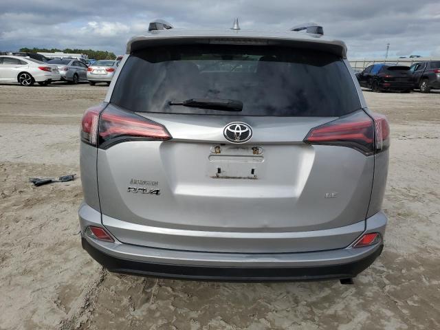 Photo 6 from auction – 2018 TOYOTA RAV4 LE with VIN 2T3ZFREV3JW425658