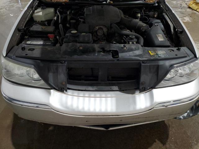 Photo 11 from auction – 2004 LINCOLN TOWN CAR E with VIN 1LNHM81W24Y665543